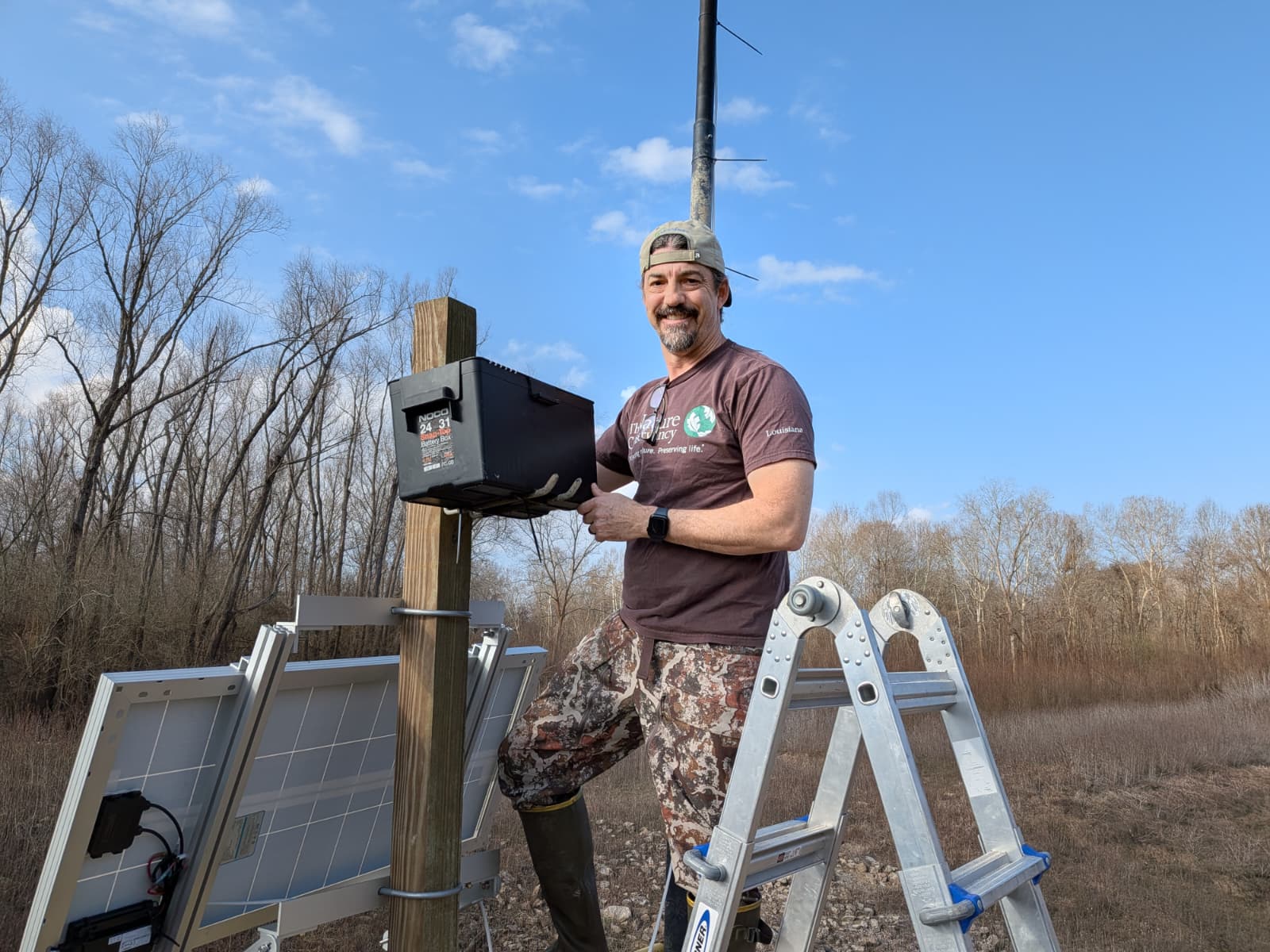 Bryan Piazza (TNC) installing the Aqualytics HyperSpectral sensor at Loch Leven